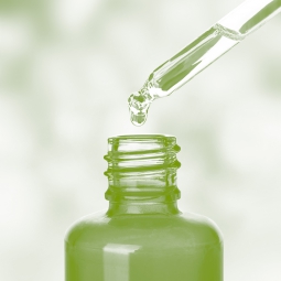 Green bottle and dropper